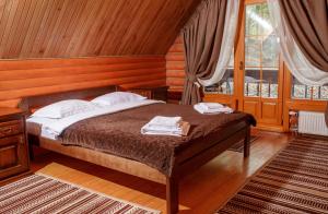 Posteľ alebo postele v izbe v ubytovaní Toursit Complex Polyana Kvasova