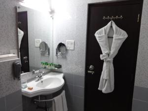 Koupelna v ubytování Capitol Residency