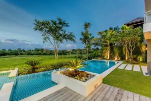 Bazén v ubytování Phocea Golf View Villa by Premier Hospitality Asia nebo v jeho okolí