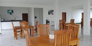 TV a/nebo společenská místnost v ubytování Rinjani Hill Hotel