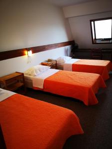 Posteľ alebo postele v izbe v ubytovaní Motel Plitvice Zagreb