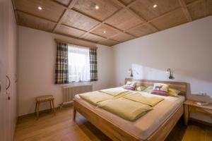 Postel nebo postele na pokoji v ubytování Urlaub am Bauernhof Windhaghof