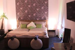 Apartmány Caffe & Grill客房内的一张或多张床位