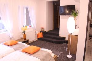 Apartmány Caffe & Grill客房内的一张或多张床位