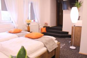 Apartmány Caffe & Grill客房内的一张或多张床位