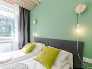 Posteľ alebo postele v izbe v ubytovaní Apartament FOREST SurfingBird Kołobrzeg