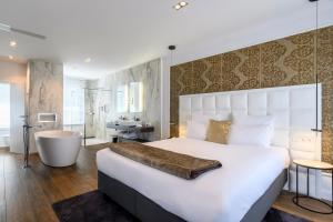 Postel nebo postele na pokoji v ubytování Hotel Rubens-Grote Markt