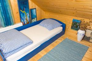 Postel nebo postele na pokoji v ubytování Zidanica Balantič