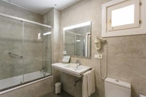 Kúpeľňa v ubytovaní Hotel Comfort Dauro 2