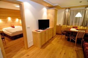 TV a/nebo společenská místnost v ubytování Chalet Regina