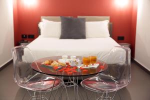 Postel nebo postele na pokoji v ubytování Cellamare Suite & Spa