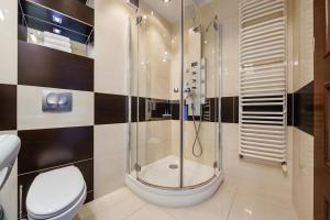 Kúpeľňa v ubytovaní Apartamenty Sun & Snow Światowida