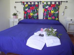Postel nebo postele na pokoji v ubytování Casa Falcone B&B