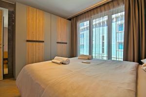 Llit o llits en una habitació de Apartments Riva-Interauto