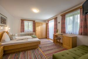 Postel nebo postele na pokoji v ubytování Urlaub am Bauernhof Windhaghof