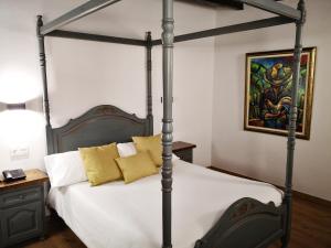 Postel nebo postele na pokoji v ubytování Palacio de Monjaraz