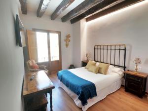 Postel nebo postele na pokoji v ubytování Palacio de Monjaraz