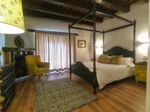 Postel nebo postele na pokoji v ubytování Palacio de Monjaraz