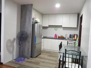 Кухня или мини-кухня в Vivacity Jazz Suites Condominium
