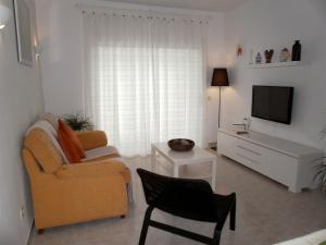 TV a/nebo společenská místnost v ubytování Apartaments Estarsol
