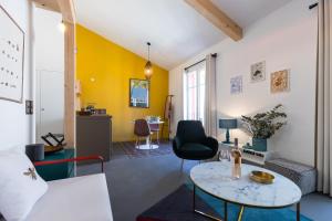 Posezení v ubytování L'Abeille - Boutique Apartments