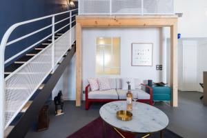 Posezení v ubytování L'Abeille - Boutique Apartments