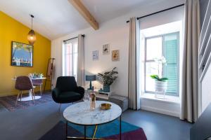 Posezení v ubytování L'Abeille - Boutique Apartments