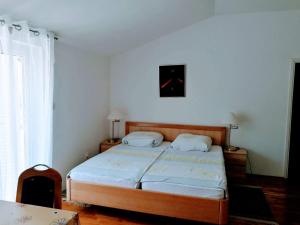 Postel nebo postele na pokoji v ubytování Apartment Coskovic