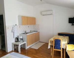Kuchyň nebo kuchyňský kout v ubytování Apartment Coskovic + 19 fotografií