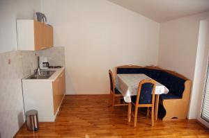 Kuchyň nebo kuchyňský kout v ubytování Apartment Coskovic