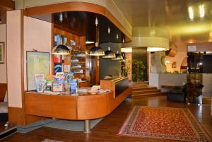 Kuchyň nebo kuchyňský kout v ubytování Hotel Salieri