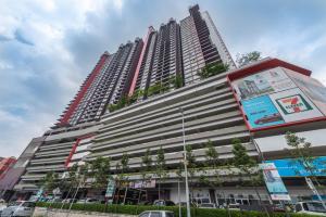 a tall building with plants on the side of it at PV21 Setapak, Wangsamaju, Melawati- Room Only in Kuala Lumpur