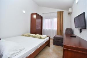 Letto o letti in una camera di Hotel Galeb