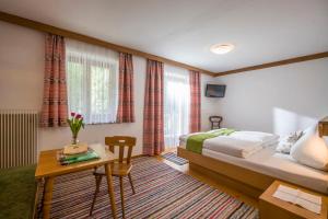 Postel nebo postele na pokoji v ubytování Urlaub am Bauernhof Windhaghof