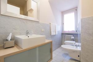 Ванная комната в Casa Vacanza Fontana Del Delfino
