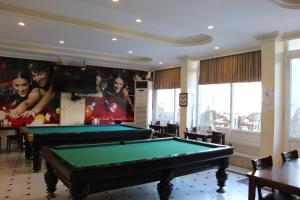 a billiard room with a pool table at Grand Didyma Hotel in Didim