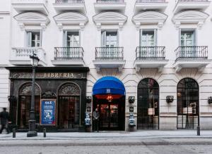 a building with a sign on the front of it at Only YOU Boutique Hotel Madrid in Madrid