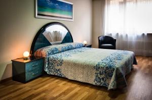 Voodi või voodid majutusasutuse Residenze dell'Angelo toas