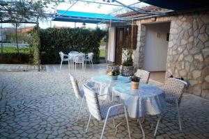 Patio nebo venkovní prostory v ubytování Apartments Cvelic Milovcic