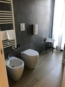 Koupelna v ubytování ROMA ROOMS
