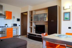 A kitchen or kitchenette at Bnbook - Volta Fiera Milano