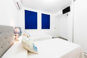 Tempat tidur dalam kamar di EDIFICIO SUR