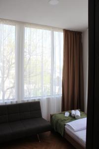 Postel nebo postele na pokoji v ubytování Guest House Chiko