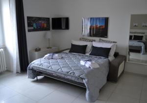 Postel nebo postele na pokoji v ubytování Il profumo dei Sassi Holiday Home