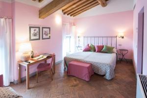 Postel nebo postele na pokoji v ubytování Villa Ducci
