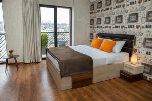 Postel nebo postele na pokoji v ubytování Boutique Hotel