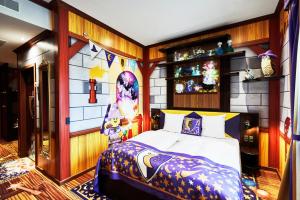 Ein Bett oder Betten in einem Zimmer der Unterkunft LEGOLAND Castle Hotel