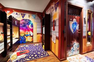 Ein Bett oder Betten in einem Zimmer der Unterkunft LEGOLAND Castle Hotel