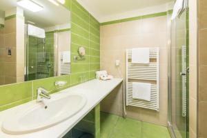 Koupelna v ubytování Hotel Kaskáda
