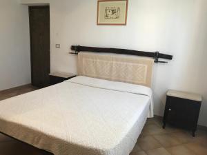 Postel nebo postele na pokoji v ubytování Villa Sa Curcurica